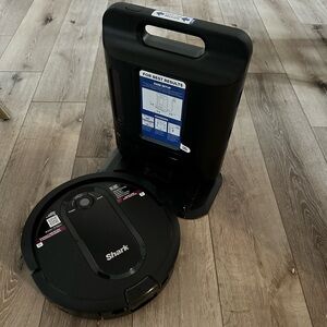 Self empty shark robot vacuum. New without box.